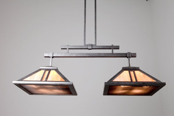  The expressive lines and handcrafted details of this pool light honor true craftsmanship as the fountainhead of good design. 