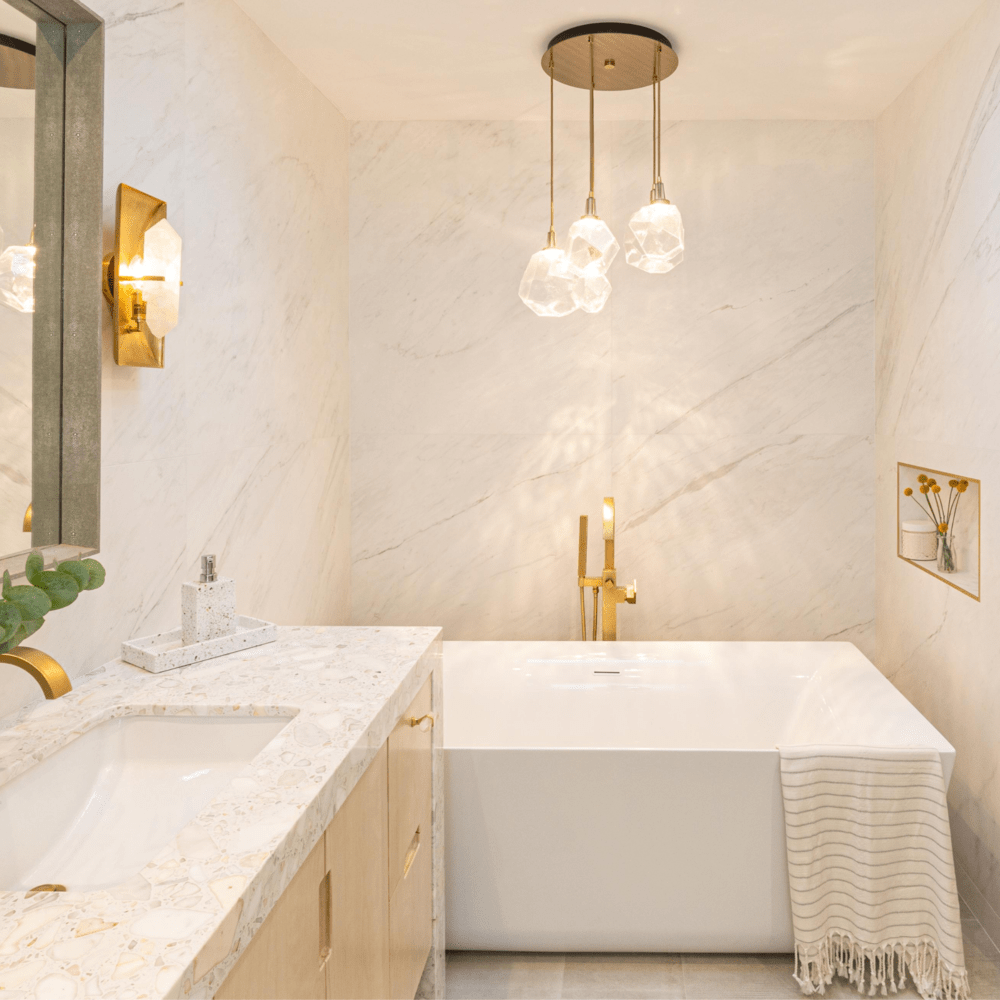 A Hammerton Studio Gem multi-pendant adds Hollywood glam to this elegant LA bath. Interiors: Kelly Shepard Designs | Los Angeles, CA