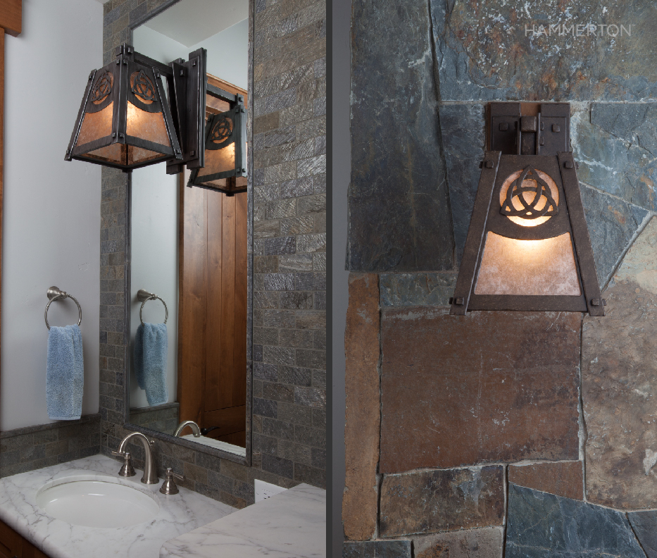 A Craftsman ID8089 sconce, modified to incorporate a custom Celtic knot, provides a whimsical focal point in this powder room of an Irish family home.