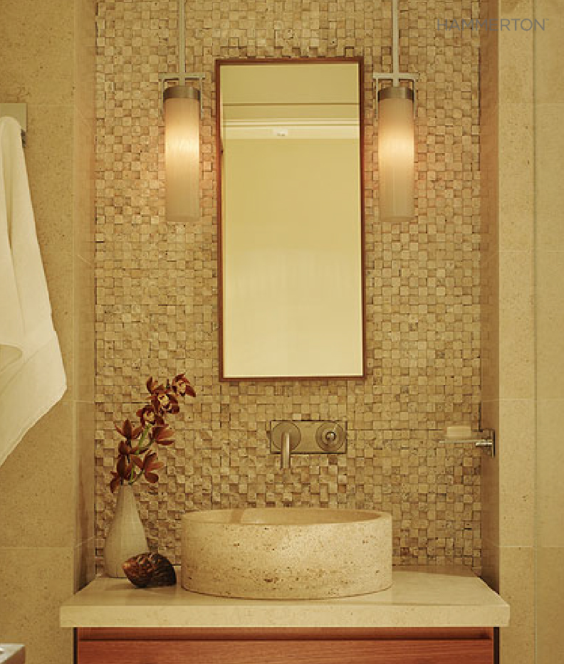 A pair of Contemporary LA2095 pendants in light blown glass beautifully complements the beachy feel of this seaside powder room. Interiors by Pamela Pennington Studios.