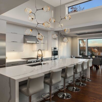 Beautiful kitchen in new luxury home, with waterfall island, sta