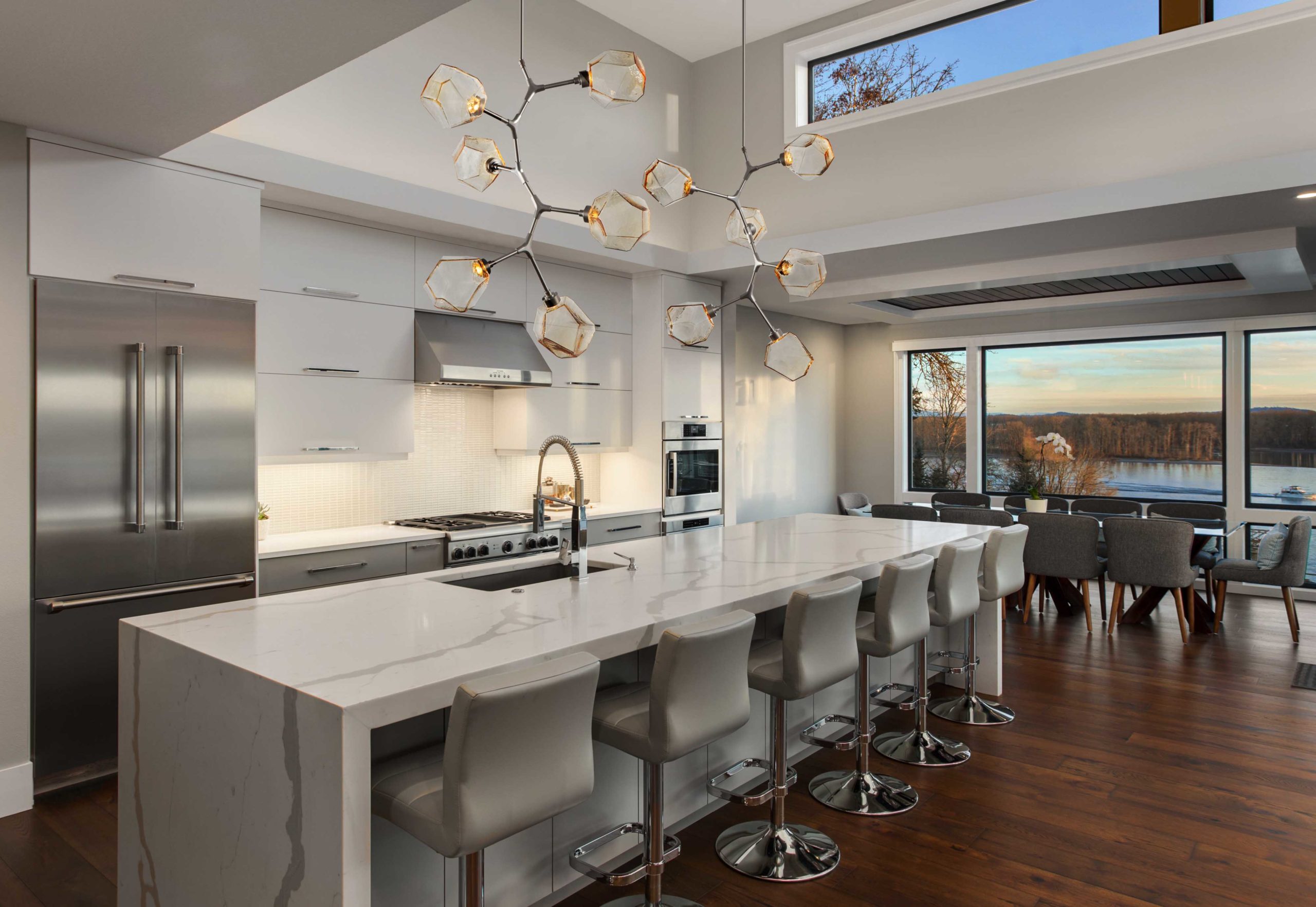 Beautiful kitchen in new luxury home, with waterfall island, sta