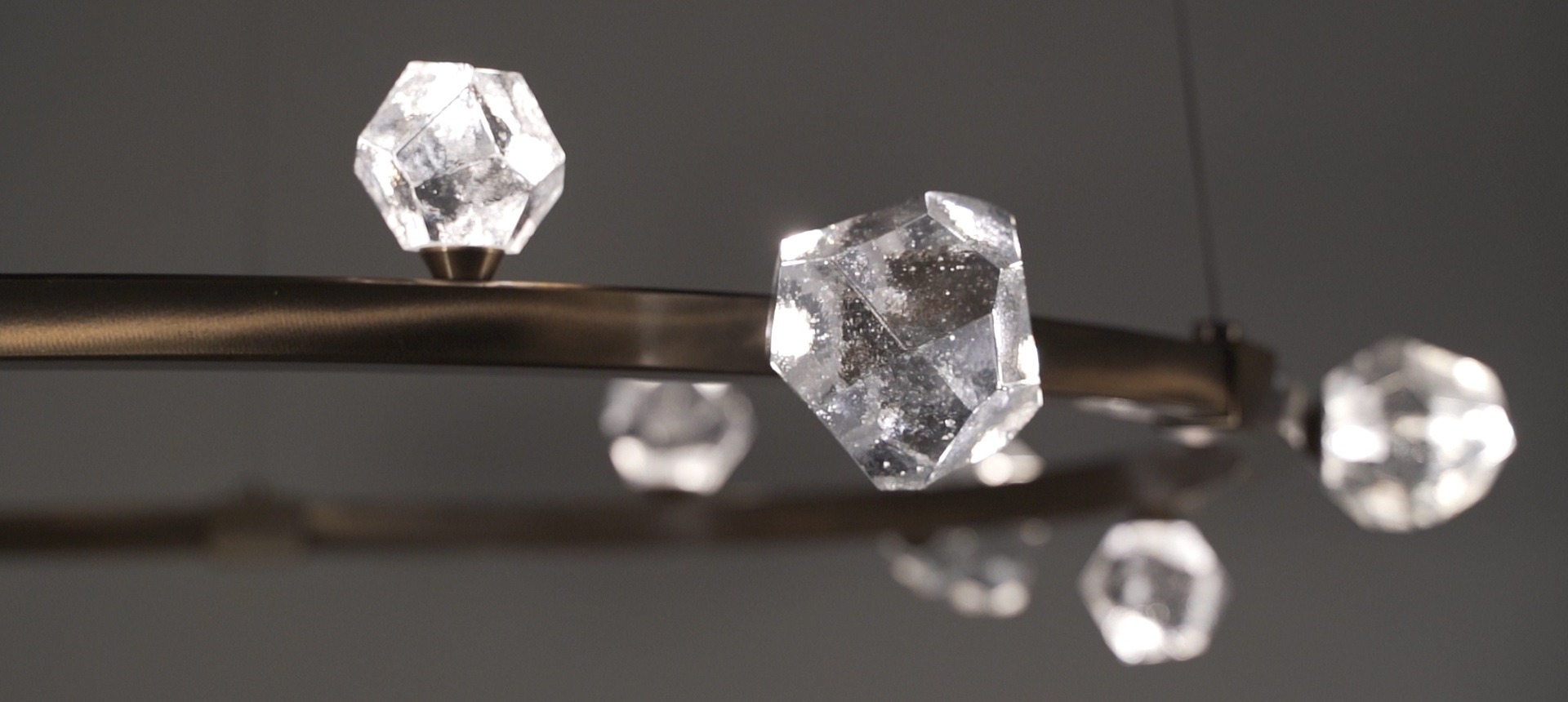 Detail of led-illuminated cast glass 'gems' on a Hammerton Studio Stella ring chandelier