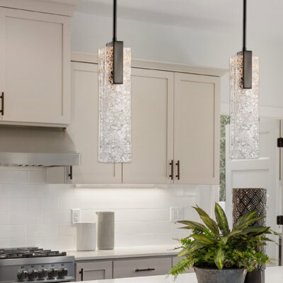 Beautiful kitchen in new luxury home with waterfall island, quar
