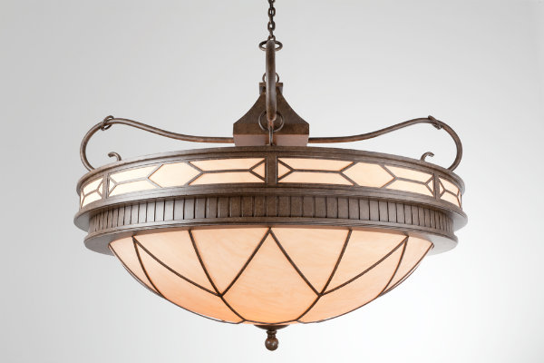 This subtly organic dome fixture combines principles of Arts & Crafts design with more contemporary metalwork details.