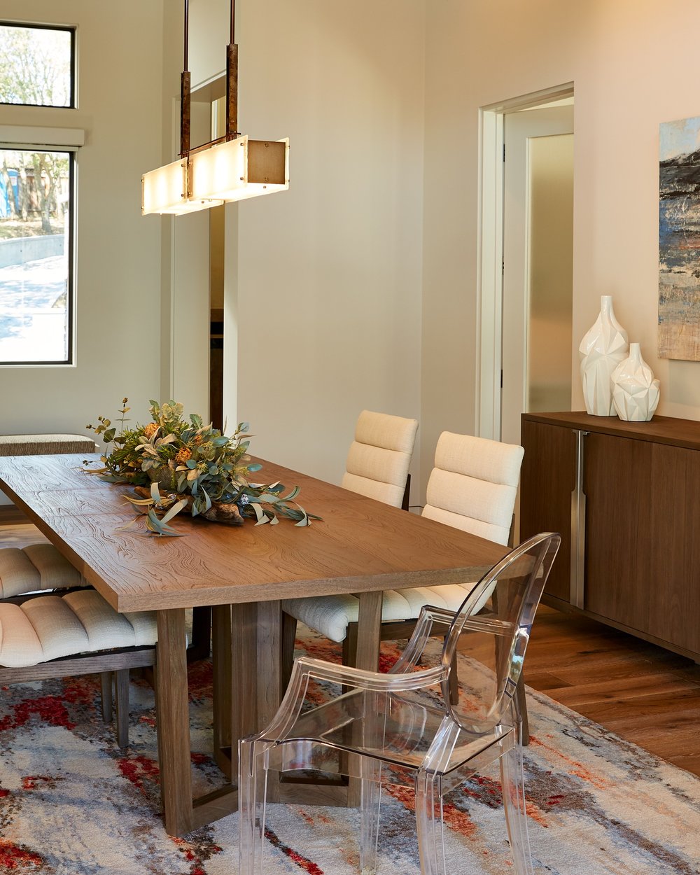 From Hammerton Studio, an Urban Loft ‘Trestle’ linear suspension floats above a dining table.