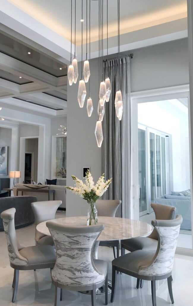 A Hammerton Studio  Rock Crystal round multi-port  strikes the perfect balance between traditional and modern in this  cozy dining nook by Soco Interiors | Florida, New York, Ohio, Jackson Hole