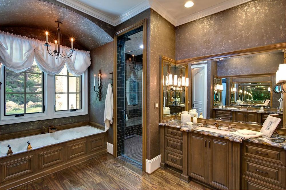 Peg's Master Bath featuring custom chandeliers and wall sconces by Hammerton